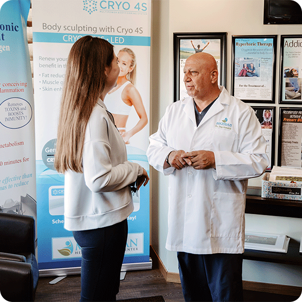 Doctor Tony consults with female patient