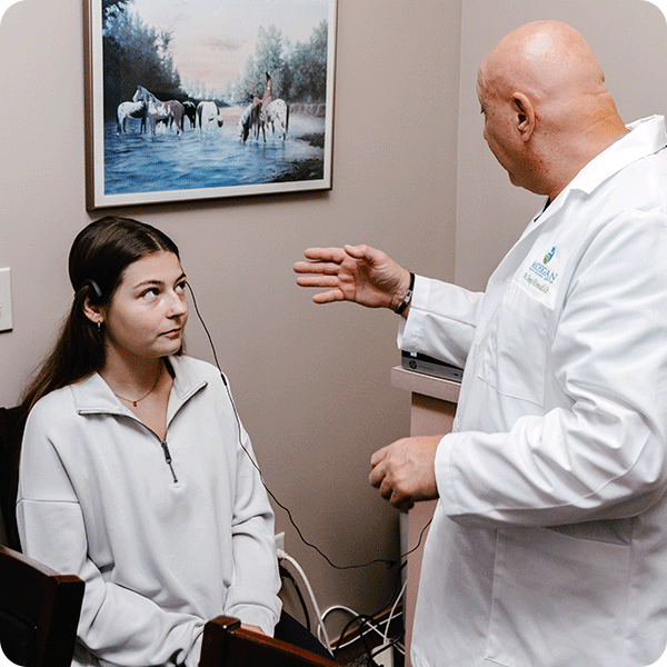 Doctor Tony instructs female patient wearing the AO Digital Body Scan